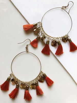 orange tassel hoop earrings